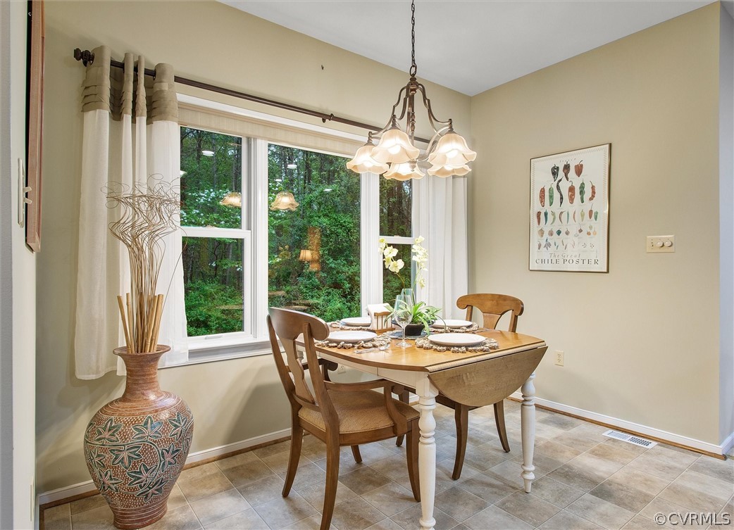 2763 Checketts Drive Sandy Hook, VA 23153 - Photo 18 of 36 a view of a dining room with furniture window and outside view