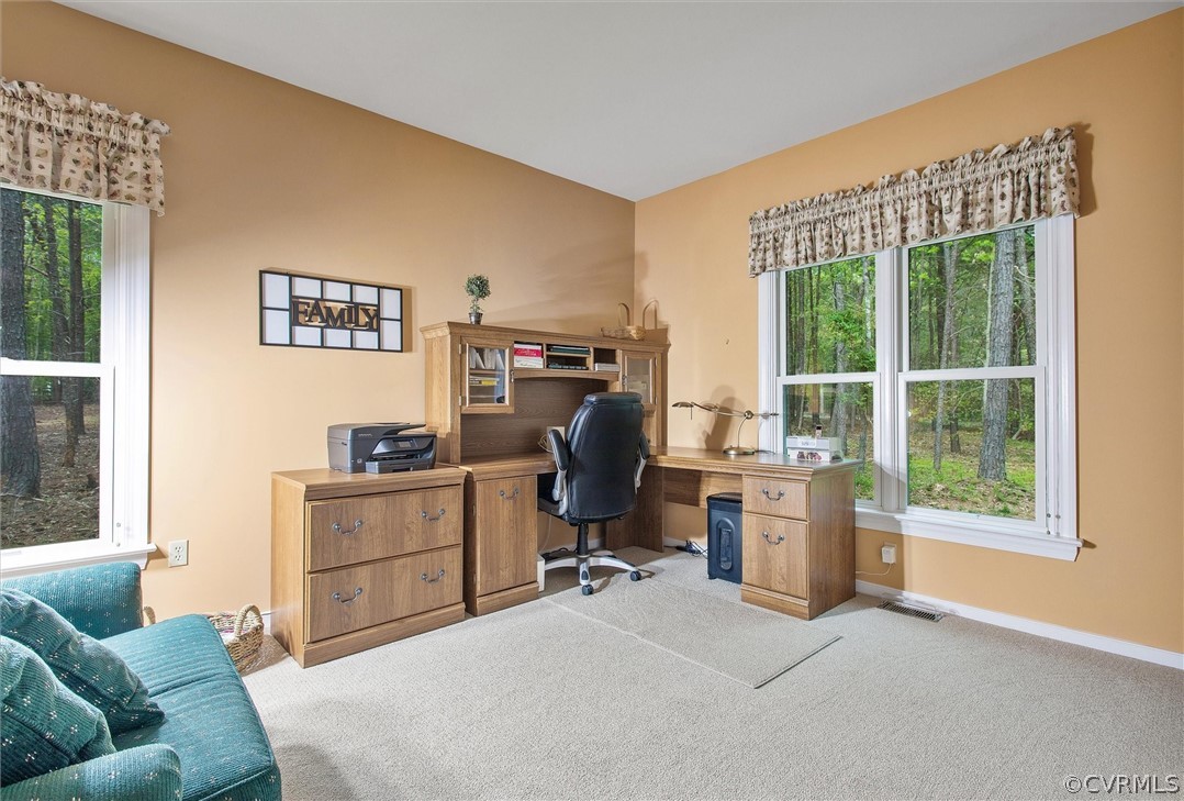 2763 Checketts Drive Sandy Hook, VA 23153 - Photo 25 of 36 a view of a livingroom with workspace and a window