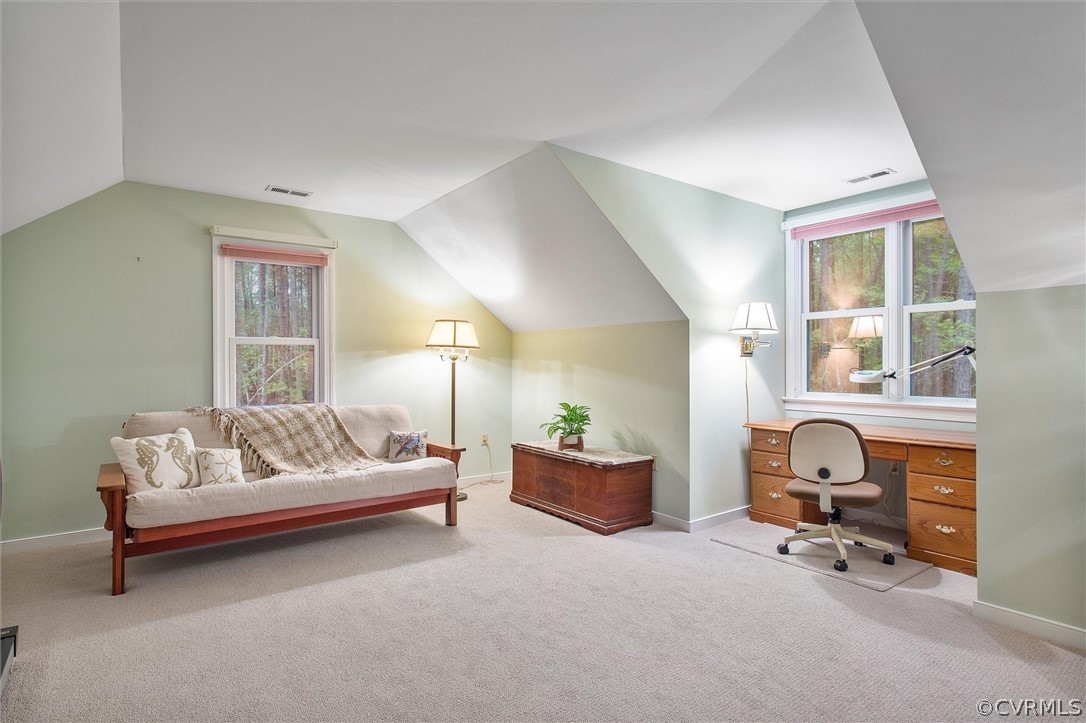 2763 Checketts Drive Sandy Hook, VA 23153 - Photo 32 of 36 a living room with furniture and a window
