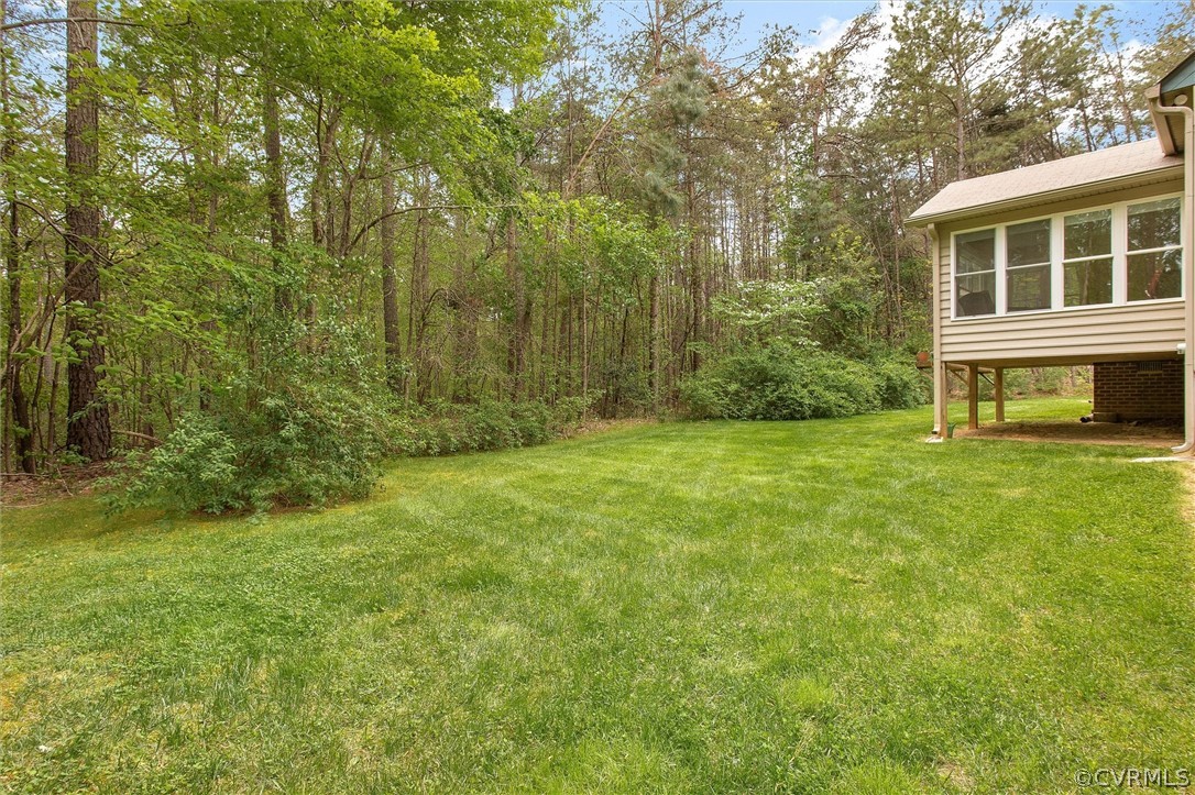 2763 Checketts Drive Sandy Hook, VA 23153 - Photo 33 of 36 a view of house with backyard