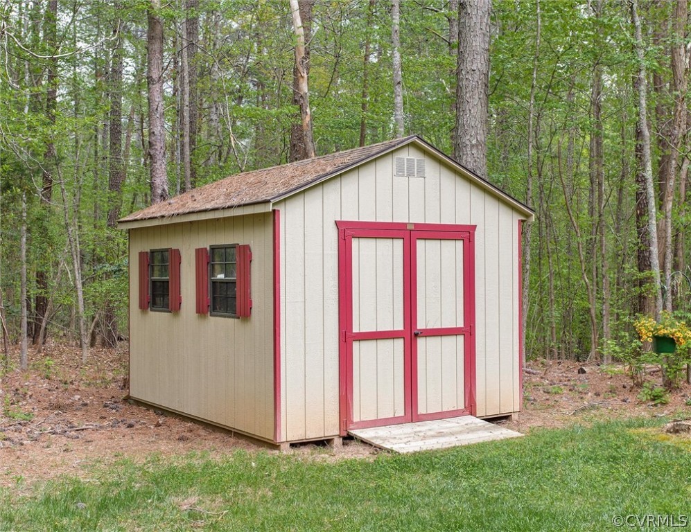 2763 Checketts Drive Sandy Hook, VA 23153 - Photo 35 of 36 a view of backyard of house with green space