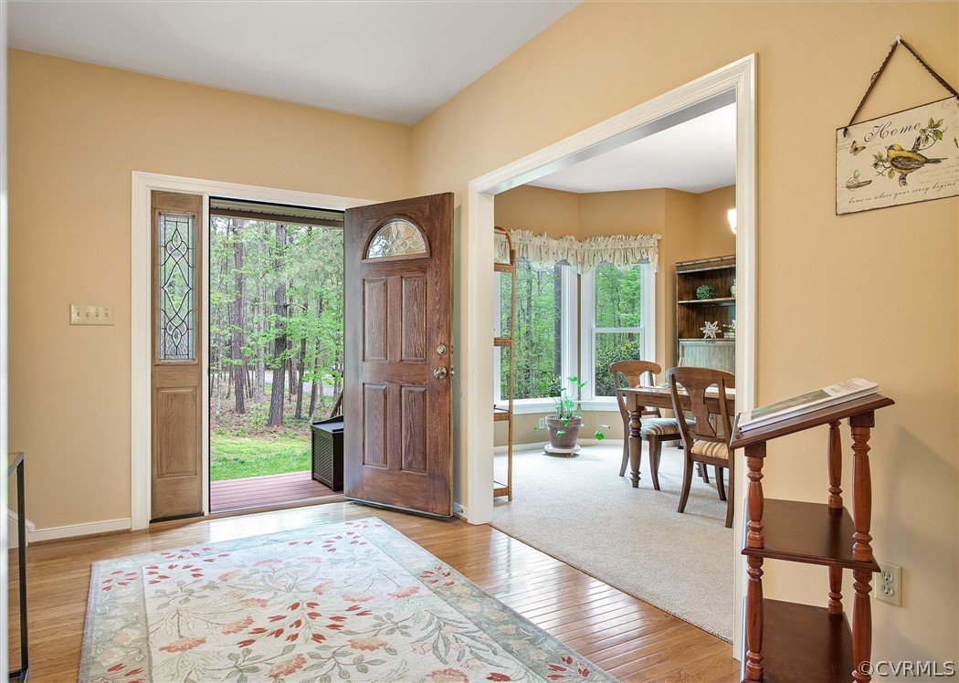 2763 Checketts Drive Sandy Hook, VA 23153 - Photo 6 of 36 a view of a livingroom with furniture and hardwood floor