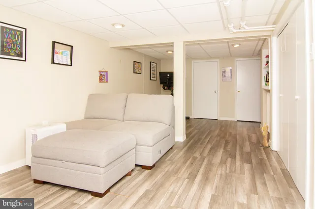 a large white bed in a white room