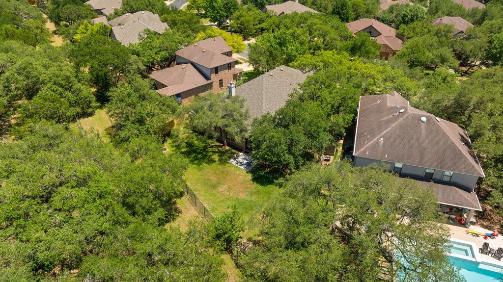 11129 Bastogne Loop Austin, TX 78739 - Photo 30 of 40 Greenbelt privacy, mature trees and quiet surroundings give this section of the neighborhood a peaceful, established feel buyers love.