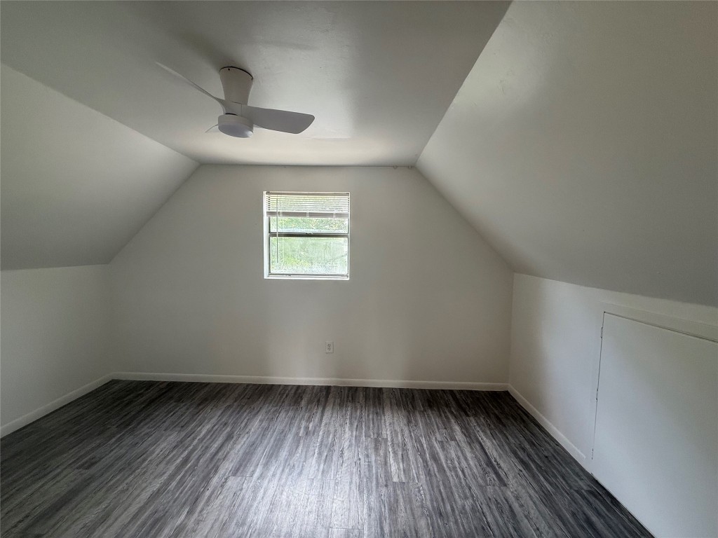622 Trinity Street Lockhart, TX 78644 - Photo 14 of 16 an empty room with a window