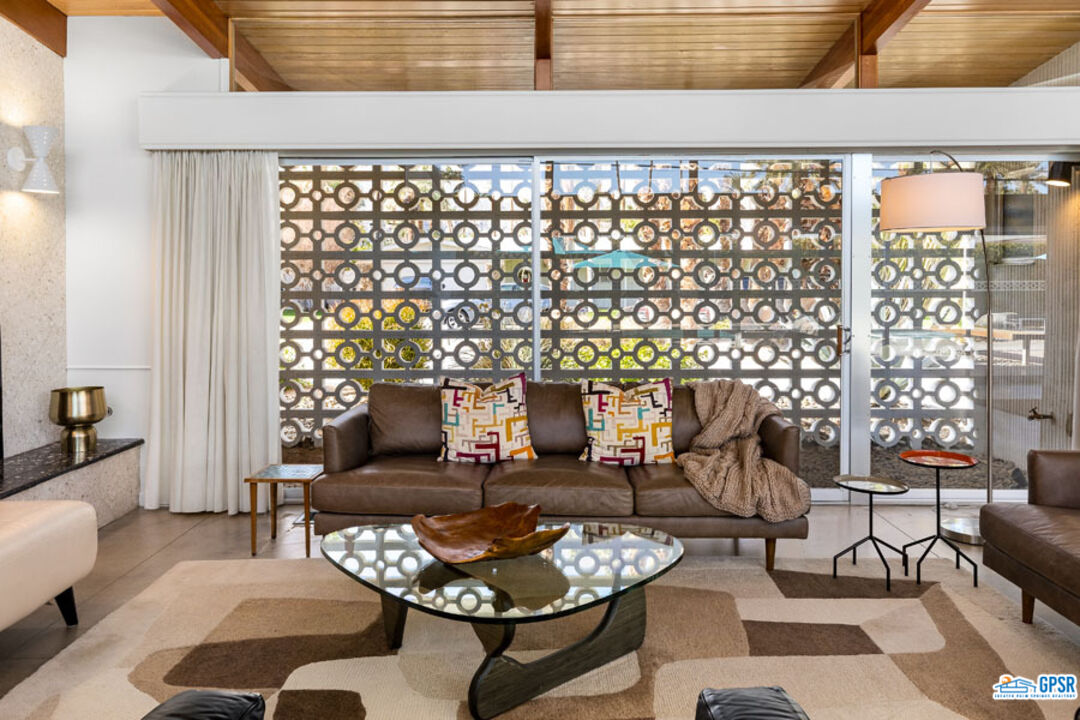 1090 Sagebrush Road Palm Springs, CA 92264 - Photo 13 of 49 a living room with furniture and outdoor view