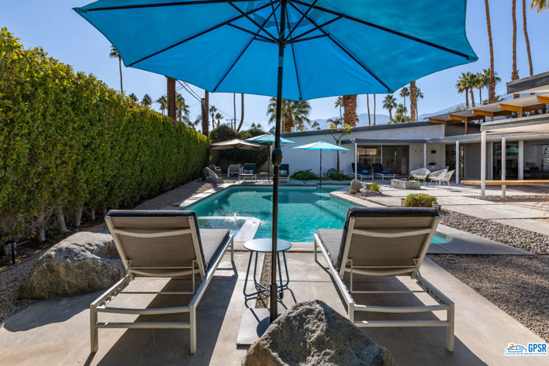1090 Sagebrush Road Palm Springs, CA 92264 - Photo 21 of 49 a view of outdoor space yard deck patio and outdoor kitchen