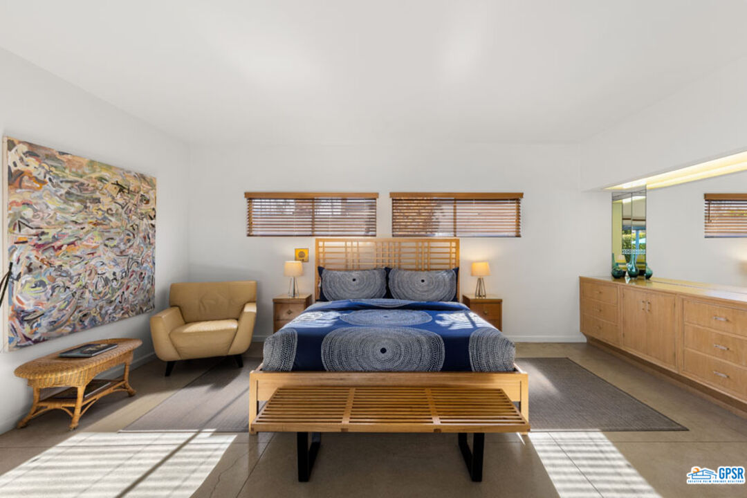 1090 Sagebrush Road Palm Springs, CA 92264 - Photo 28 of 49 a bedroom with furniture and a window