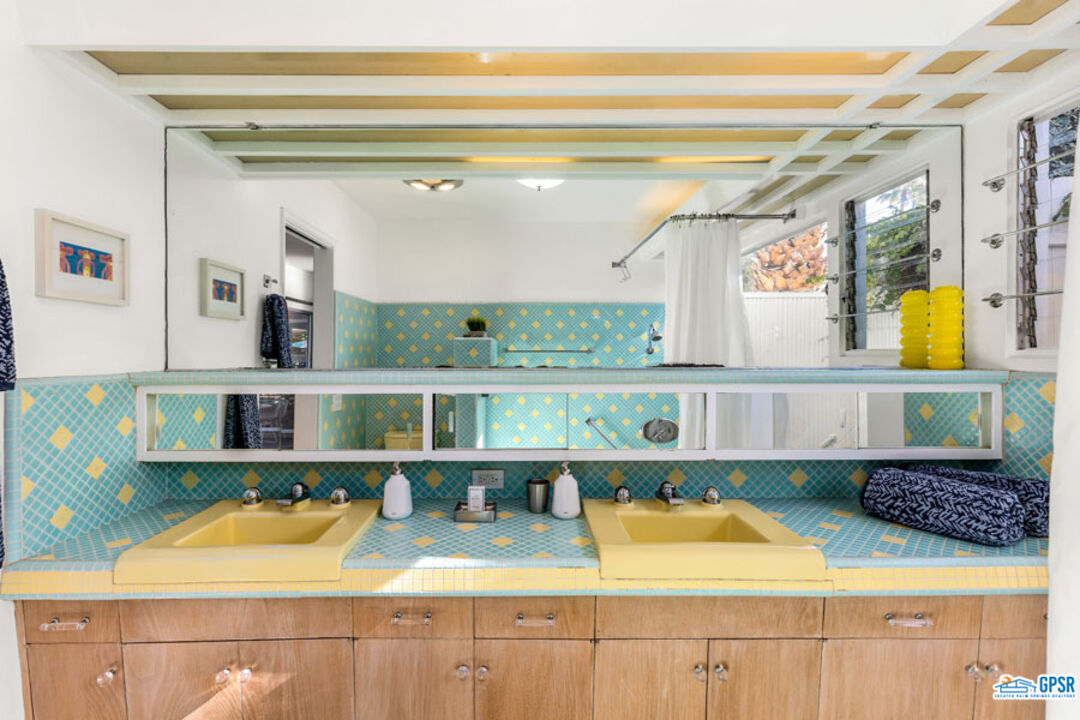 1090 Sagebrush Road Palm Springs, CA 92264 - Photo 30 of 49 a view of a room with shelves