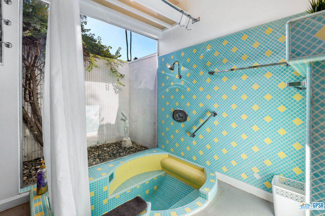 1090 Sagebrush Road Palm Springs, CA 92264 - Photo 31 of 49 a bathroom with a sink and a bathtub