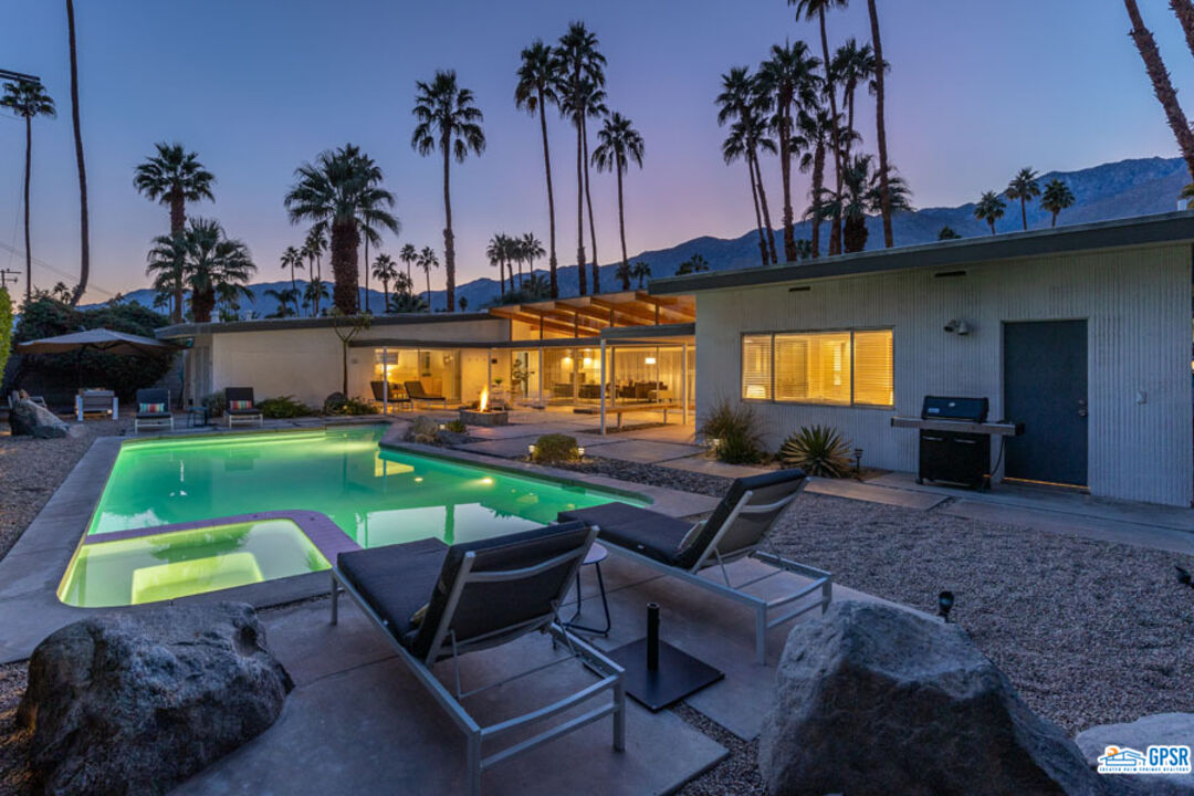 1090 Sagebrush Road Palm Springs, CA 92264 - Photo 45 of 49 a backyard of a house with table and chairs