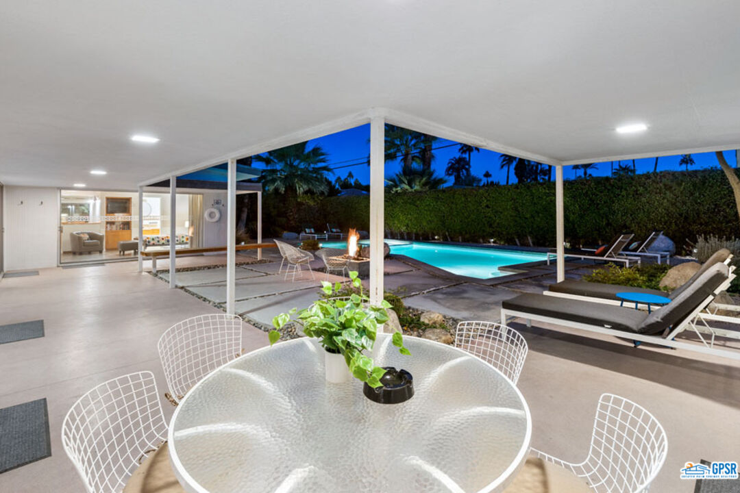 1090 Sagebrush Road Palm Springs, CA 92264 - Photo 46 of 49 a living room with furniture and white walls