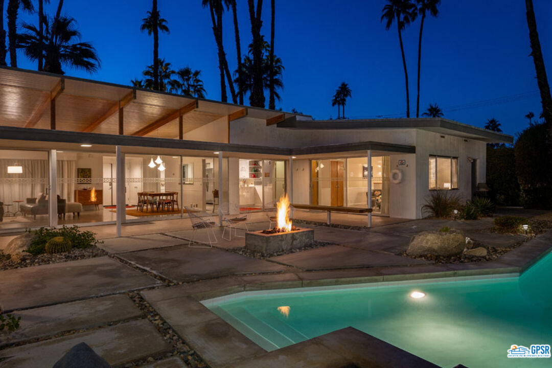1090 Sagebrush Road Palm Springs, CA 92264 - Photo 48 of 49 a view of a house with backyard porch and sitting area