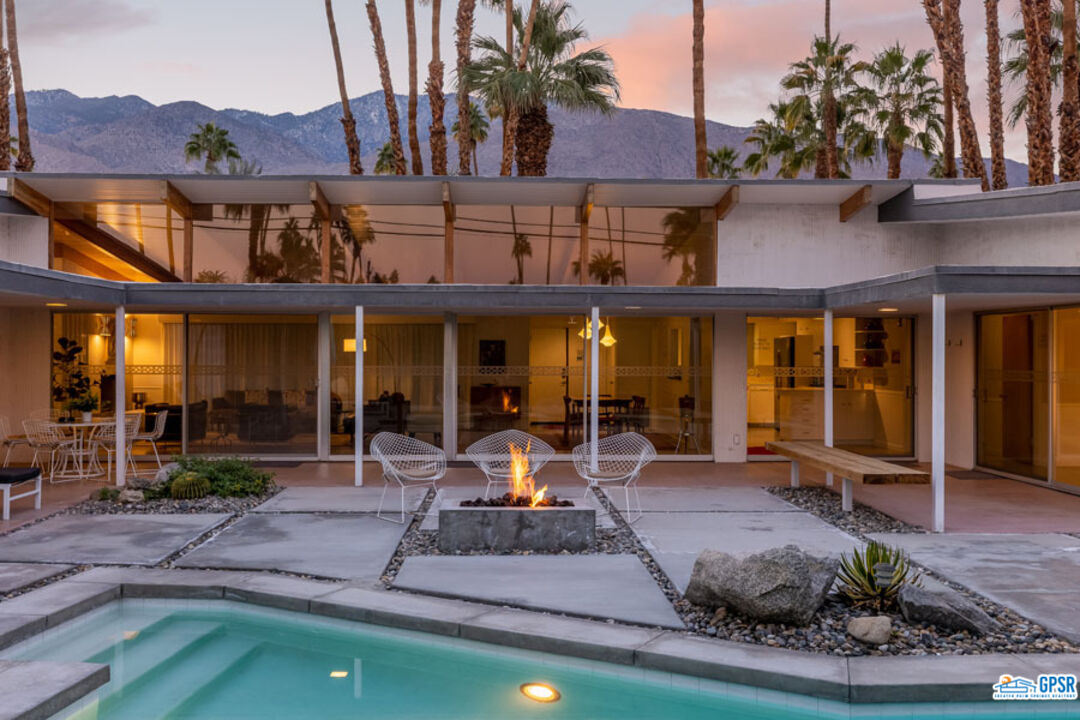 1090 Sagebrush Road Palm Springs, CA 92264 - Photo 49 of 49 a view of a cafe with sitting area
