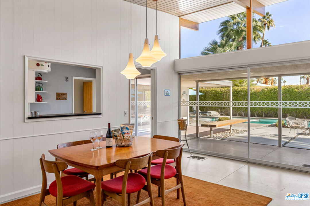 1090 Sagebrush Road Palm Springs, CA 92264 - Photo 8 of 49 a view of a dining room with furniture window and outside view