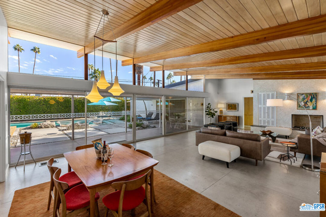 1090 Sagebrush Road Palm Springs, CA 92264 - Photo 9 of 49 a outdoor space with lots of chairs and a table