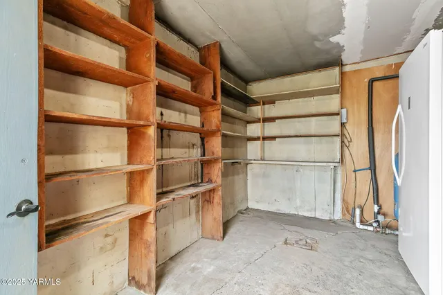 a view of a garage with wooden ceiling