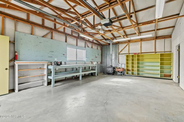 a view of a big yard with a house