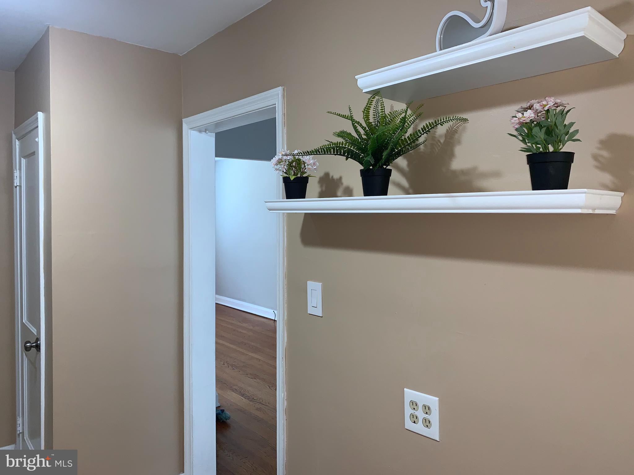 8646 Oak Road Baltimore, MD 21234 - Photo 13 of 37 KITCHEN WITH SHELVES