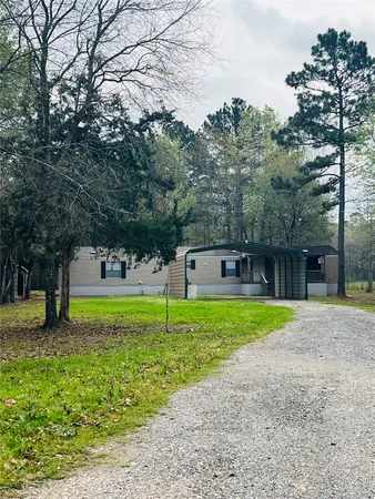 a house view with a garden space