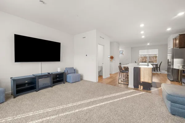 a hotel room with a television and a bed