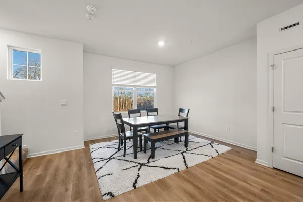 a view of a dining room with furniture