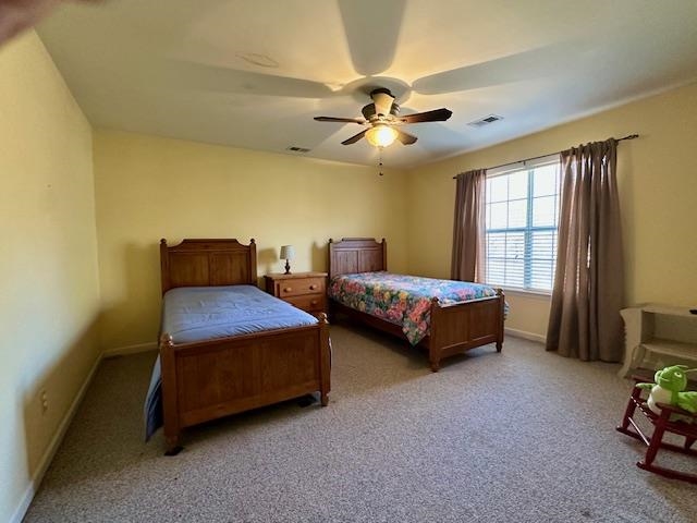 306 Old Jernigan Road Somerville, TN 38068 - Photo 16 of 22 Carpeted bedroom with baseboards and a ceiling fan