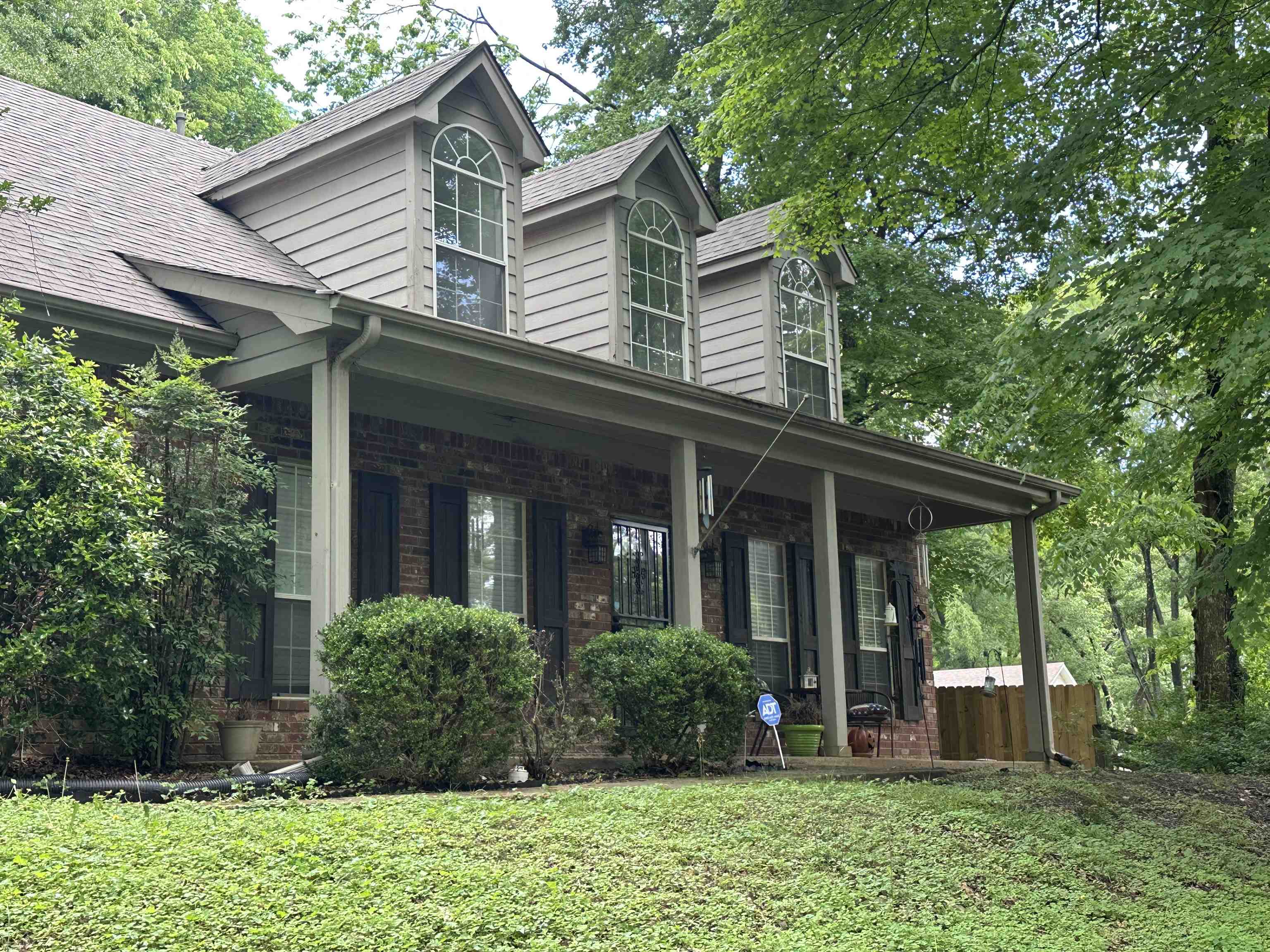 306 Old Jernigan Road Somerville, TN 38068 - Photo 2 of 22 View of front of home with covered porch, a front lawn, and roof with shingles