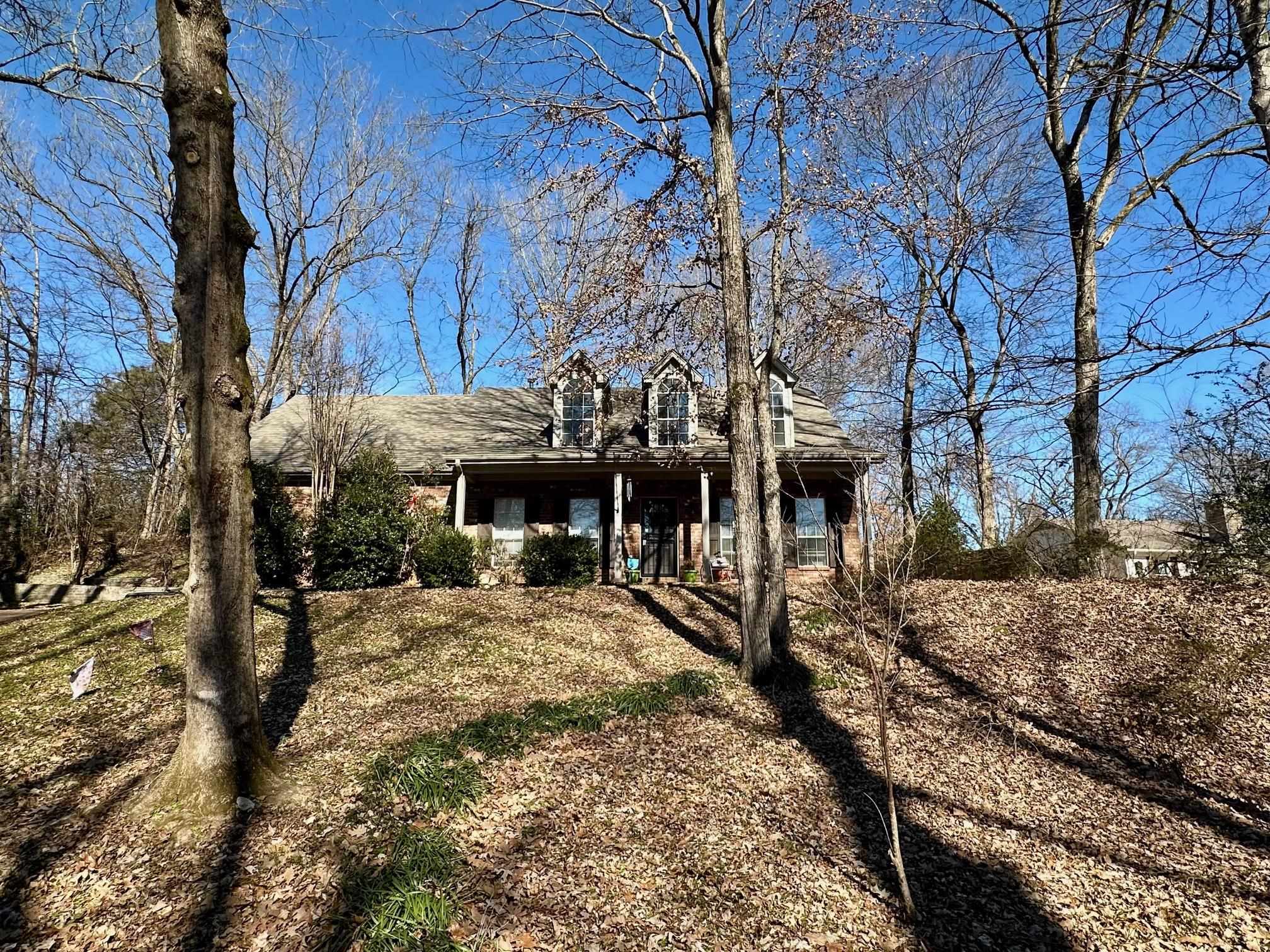 306 Old Jernigan Road Somerville, TN 38068 - Photo 3 of 22 a view of a large building with a yard