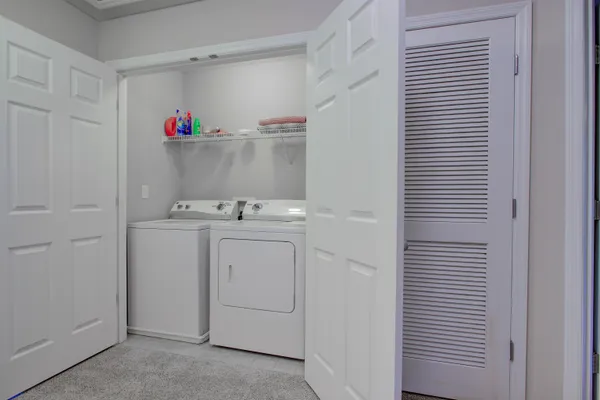 a room with storage and utility room