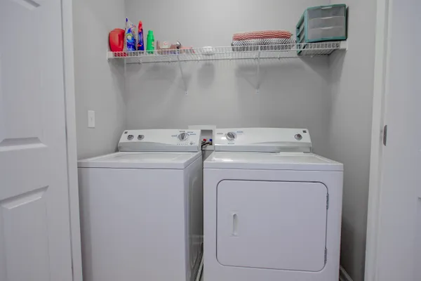 a utility room with dryer and washer