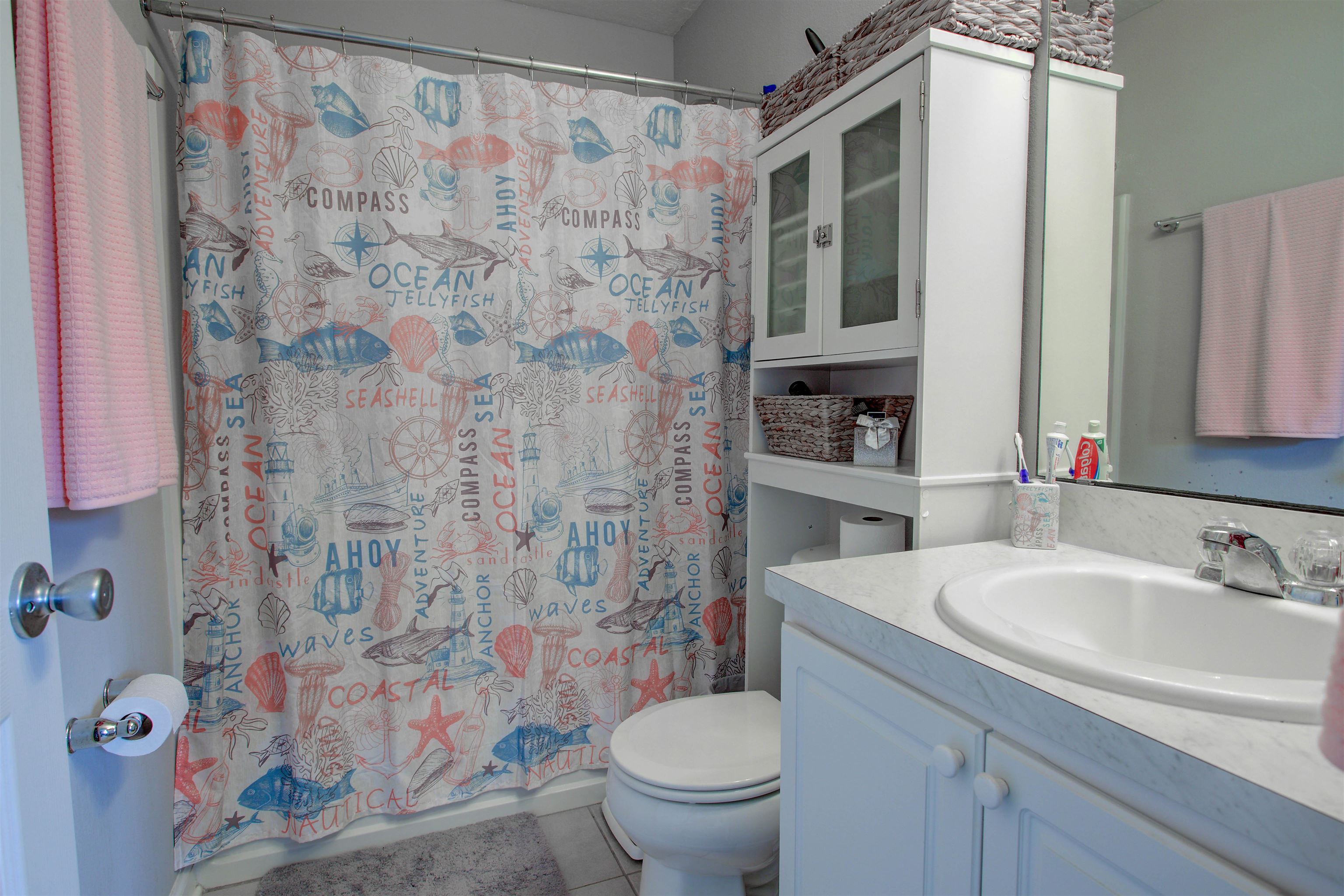28 Islander Court St. Augustine, FL 32080 - Photo 16 of 23 a bathroom with a sink toilet and shower