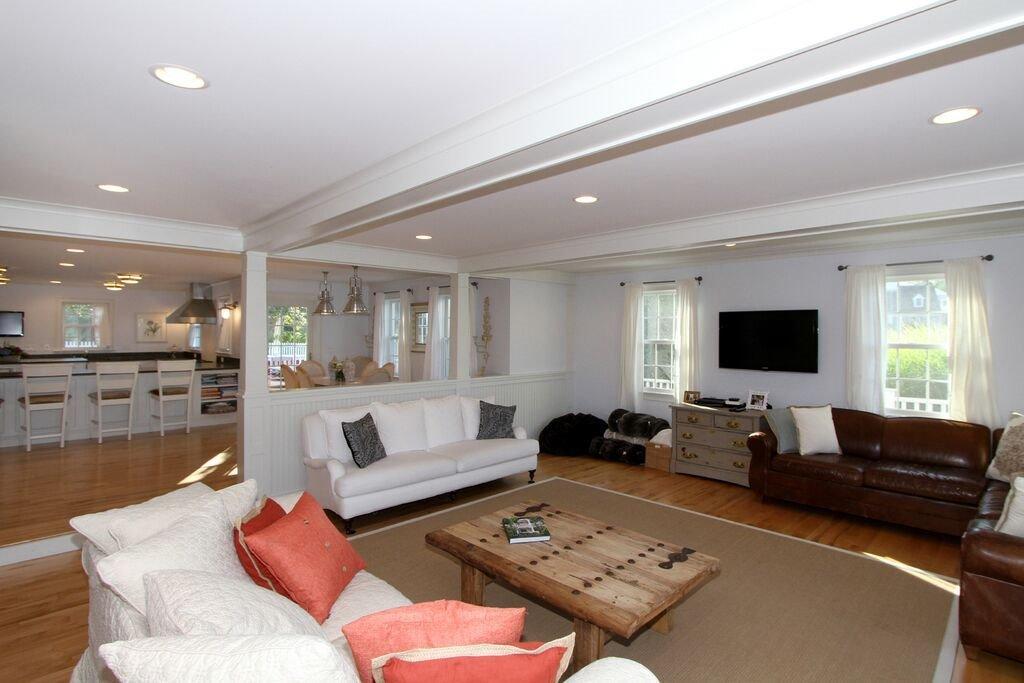 183 Stage Harbor Road Chatham, MA 02633 - Photo 8 of 35 a living room with furniture and a flat screen tv