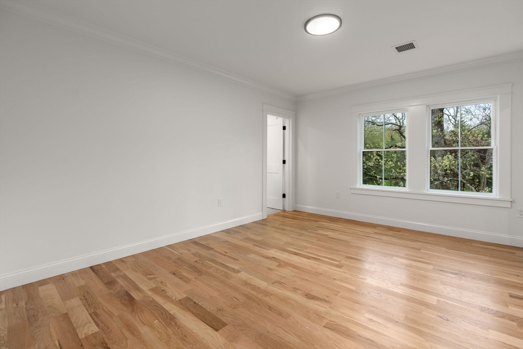82 Deer Path Lane Weston, MA 02493 - Photo 32 of 42 an empty room with a window