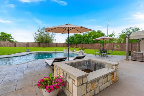 a swimming pool with outdoor view
