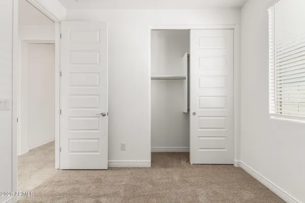 an empty room with closet