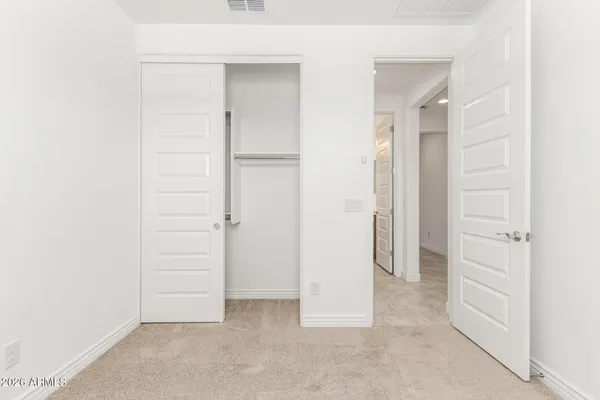 an empty room with closet