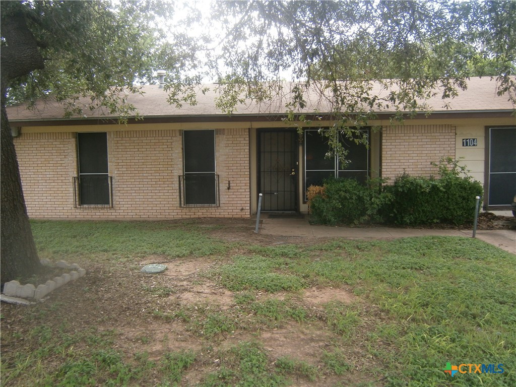1104 Gardner Road Austin, TX 78721 - Photo 2 of 3 a house view with a garden space