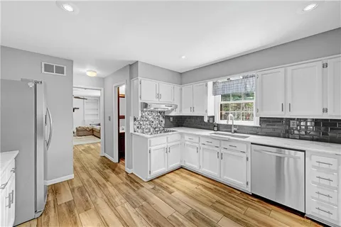 $525,000 | 4414 Dunriver Drive Southwest, Lilburn, GA 30047
