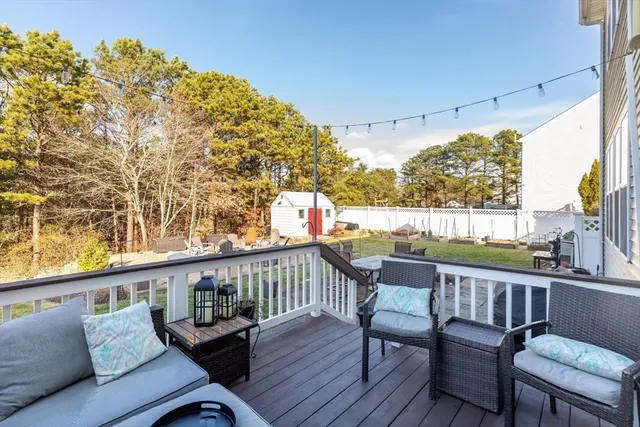 a view of a chairs and table on the deck