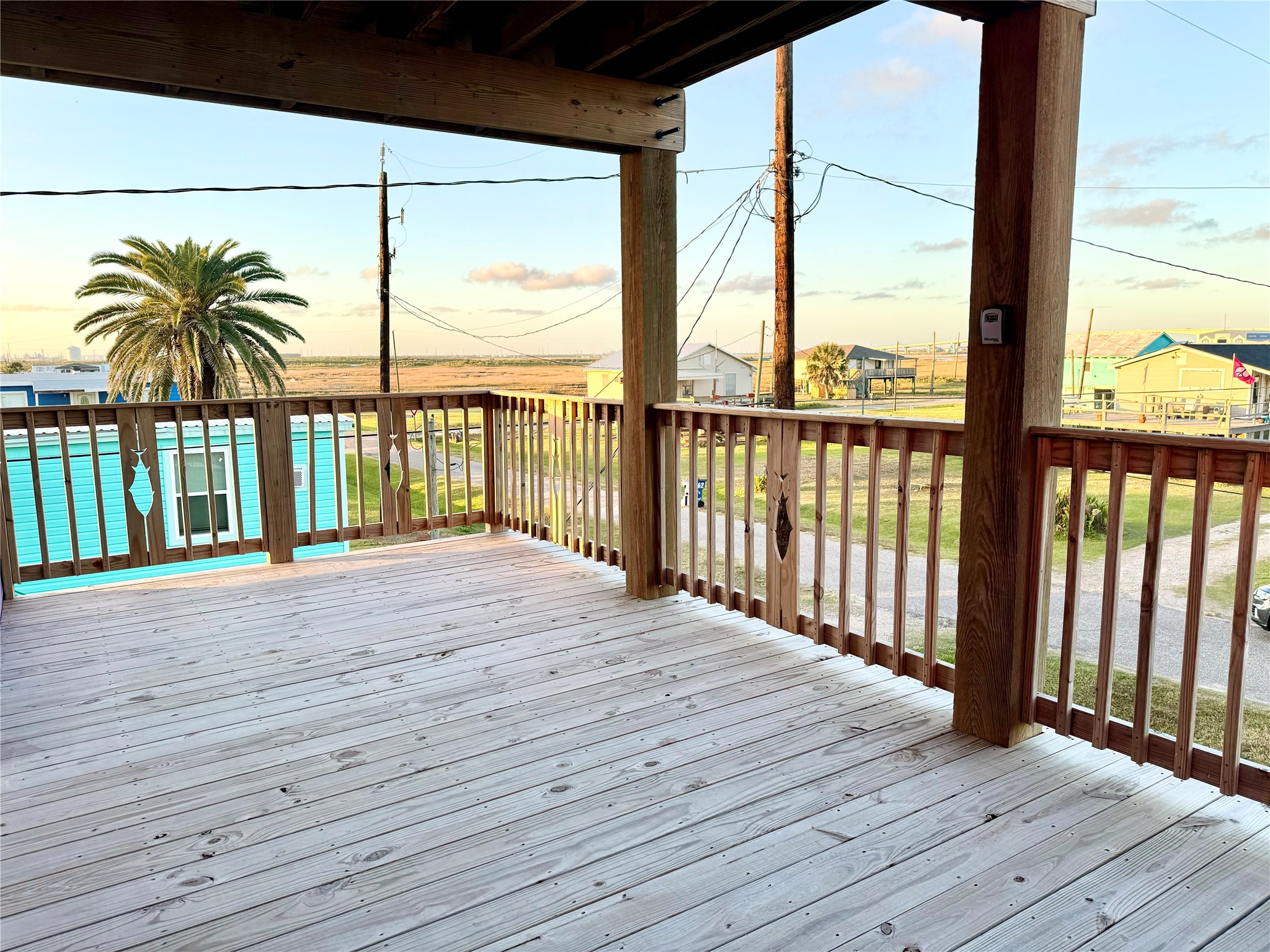 511 Caisson Street Surfside Beach, TX 77541 - Photo 24 of 33 a view of a balcony with wooden floor