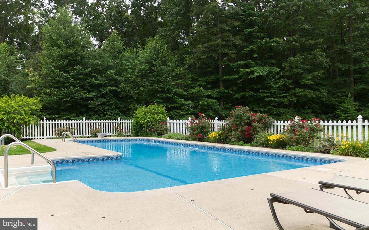 20000 Gunpowder Road Manchester, MD 21102 - Photo 4 of 30 a view of a swimming pool with a patio and yard