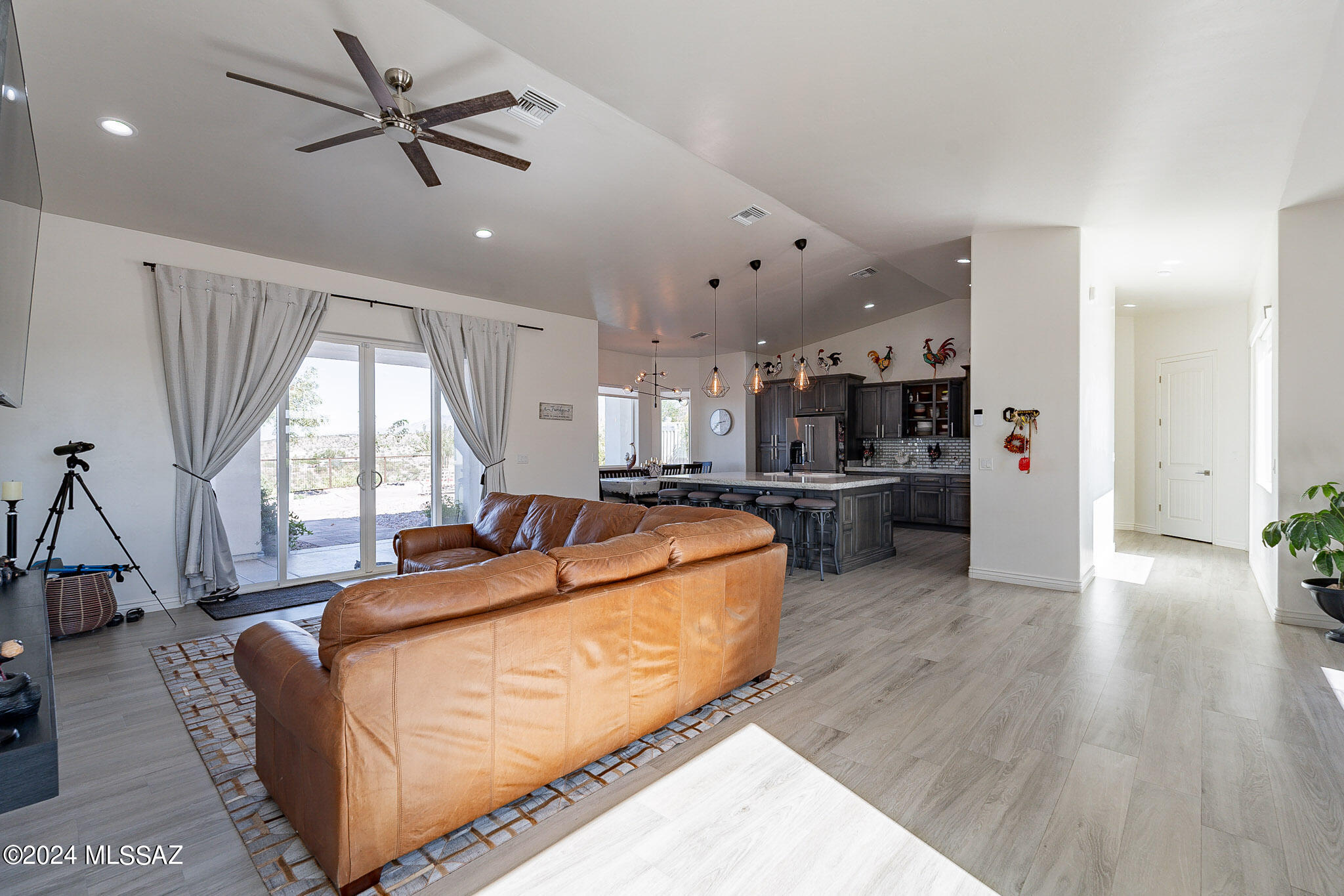 176 Avenida Ostion Rio Rico, AZ 85648 - Photo 12 of 48 a living room with furniture and kitchen view