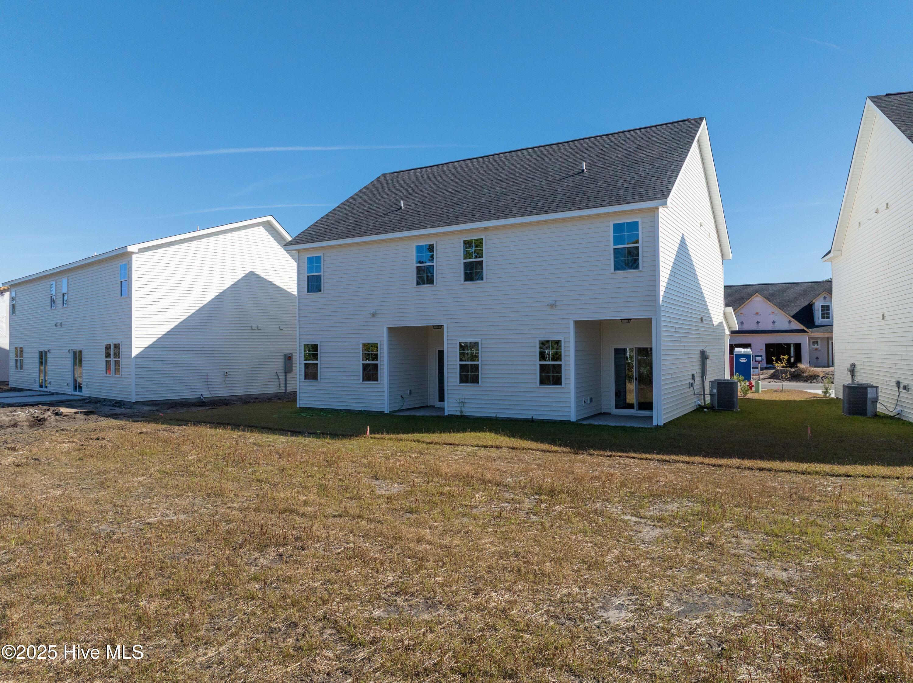 218 Sandpiper Place Holly Ridge, NC 28445 - Photo 4 of 23 218 Sand Piper - Exterior - Edited_3-2