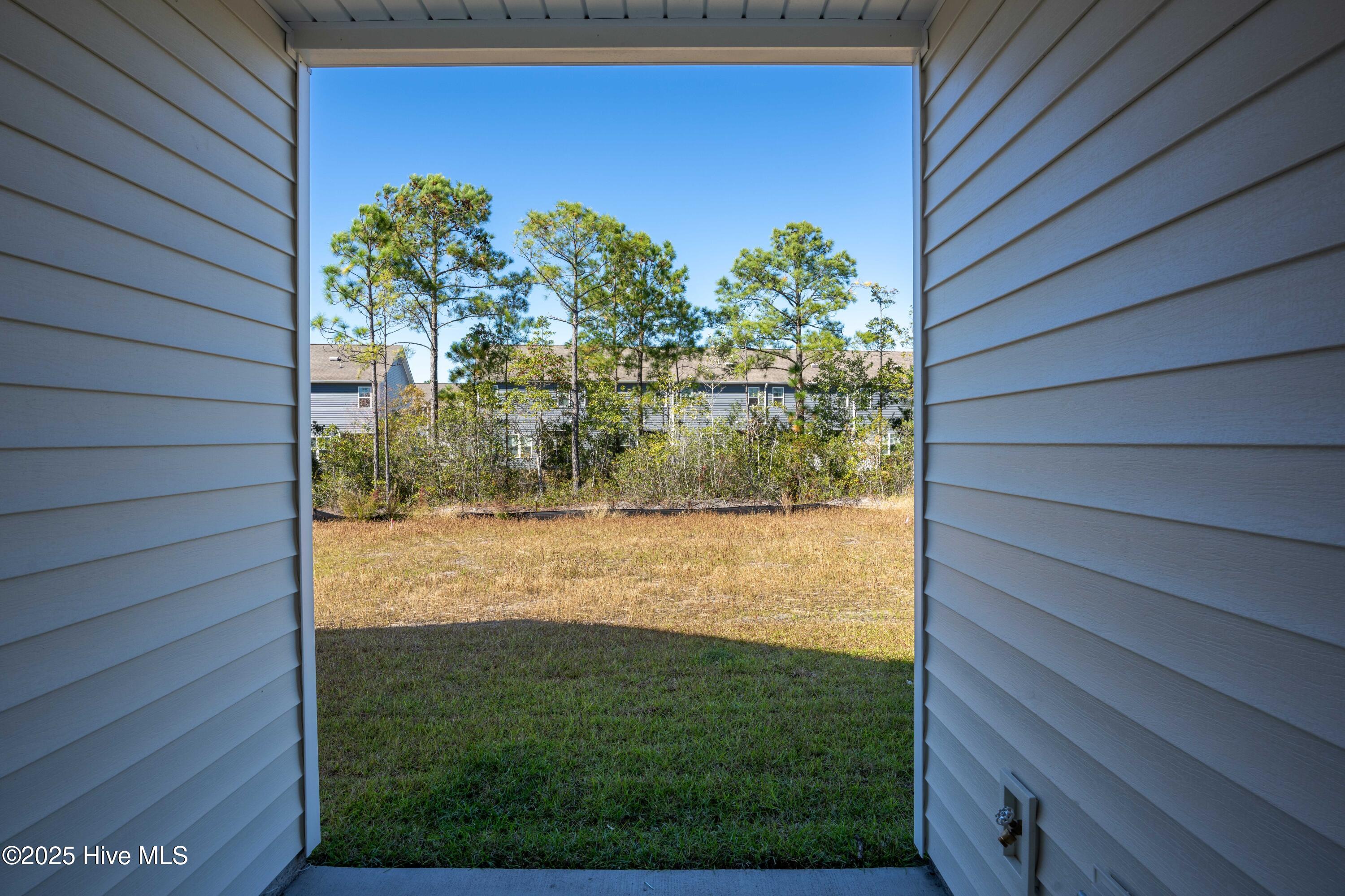 218 Sandpiper Place Holly Ridge, NC 28445 - Photo 5 of 23 218 Sand Piper - Exterior - Edited-3
