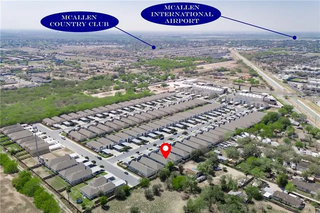 a sign that is sitting on a brick wall