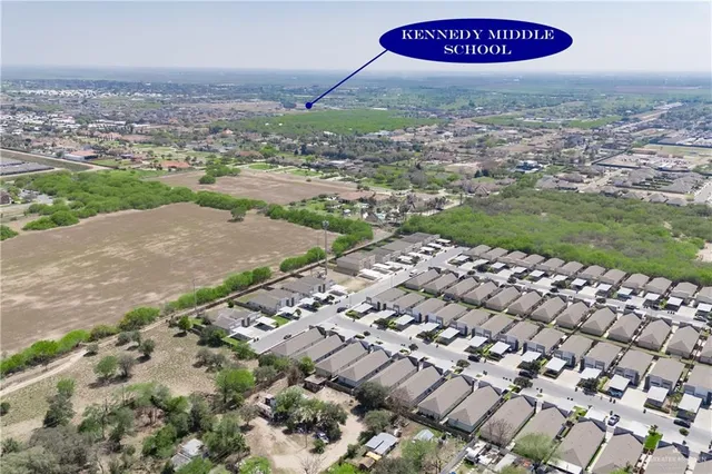 an aerial view of a red sign with of city view