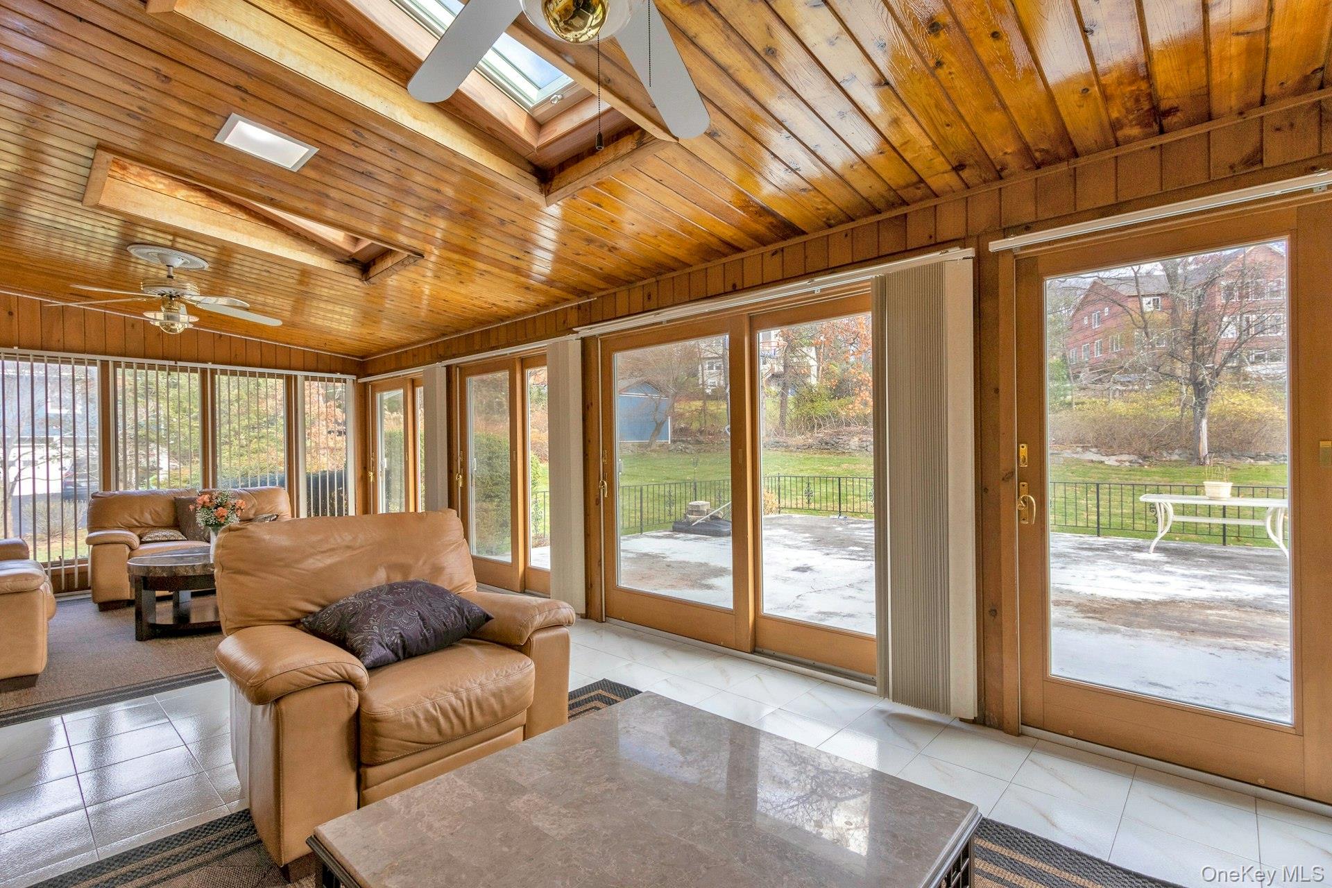 44 Greenridge Way Spring Valley, NY 10977 - Photo 17 of 46 a living room with furniture and large windows