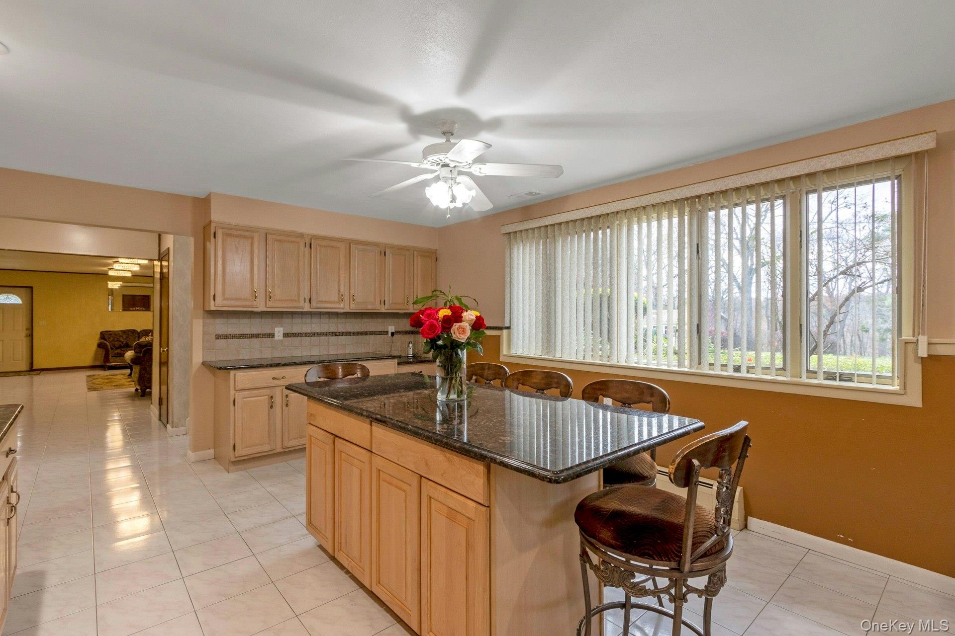 44 Greenridge Way Spring Valley, NY 10977 - Photo 28 of 46 a kitchen with a stove a sink and a refrigerator