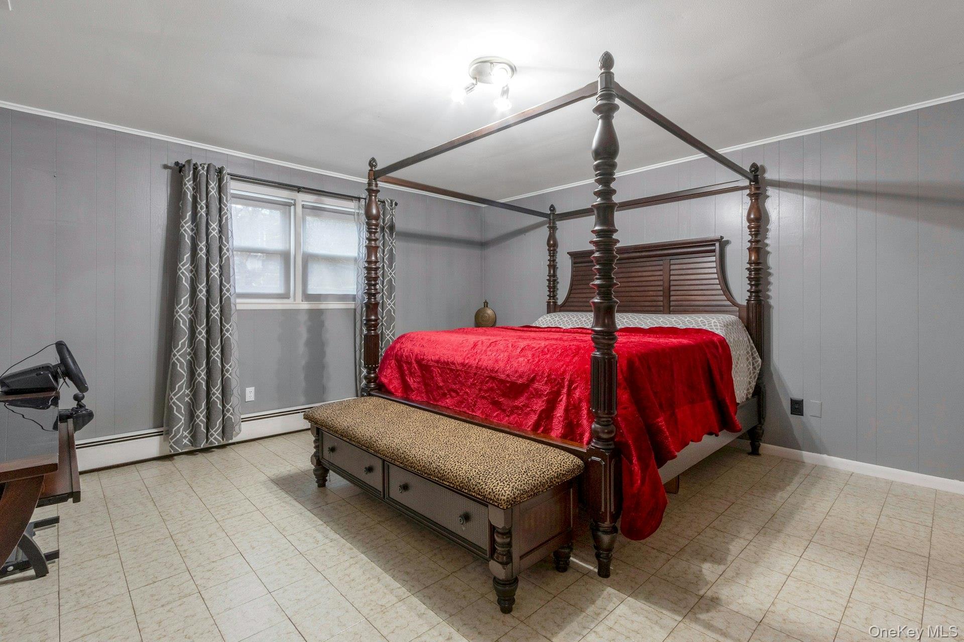 44 Greenridge Way Spring Valley, NY 10977 - Photo 34 of 46 a bedroom with a bed and a window